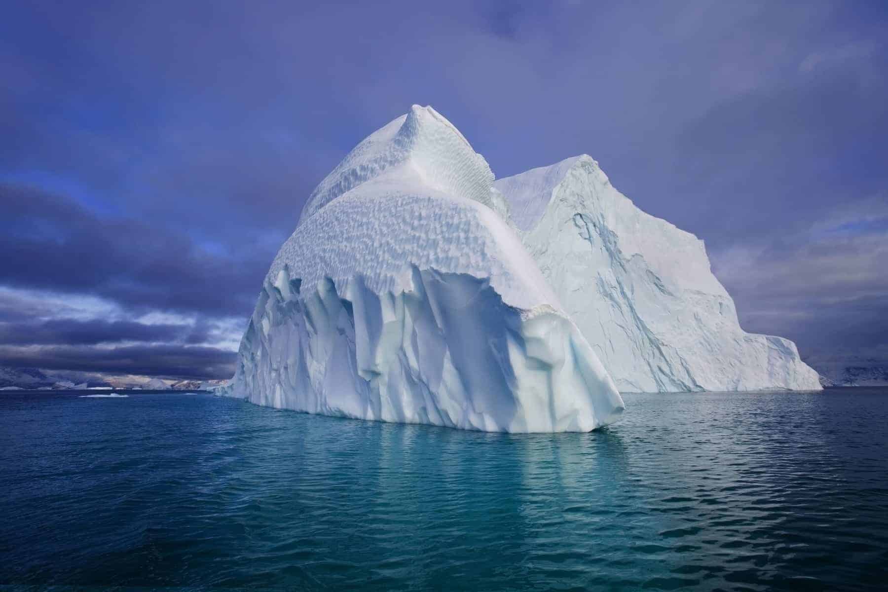 Iceberg in the Iceberg graveyard in Franz Joseph Fjord in eastern Greenland