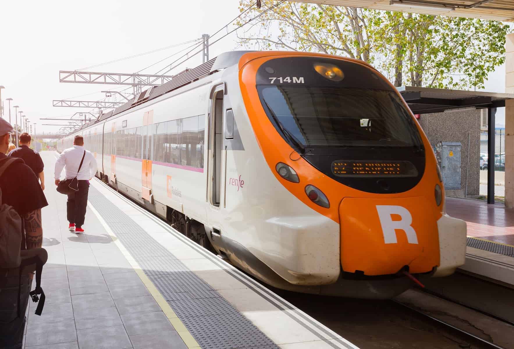 BARCELONA, SPAIN - Passengers Board the Renfe train at El Prat airport at the station