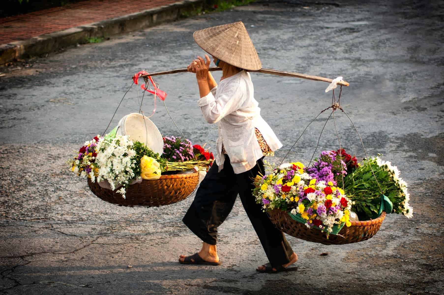 Hanoi florist vendor on Hanoi street, Vietnam