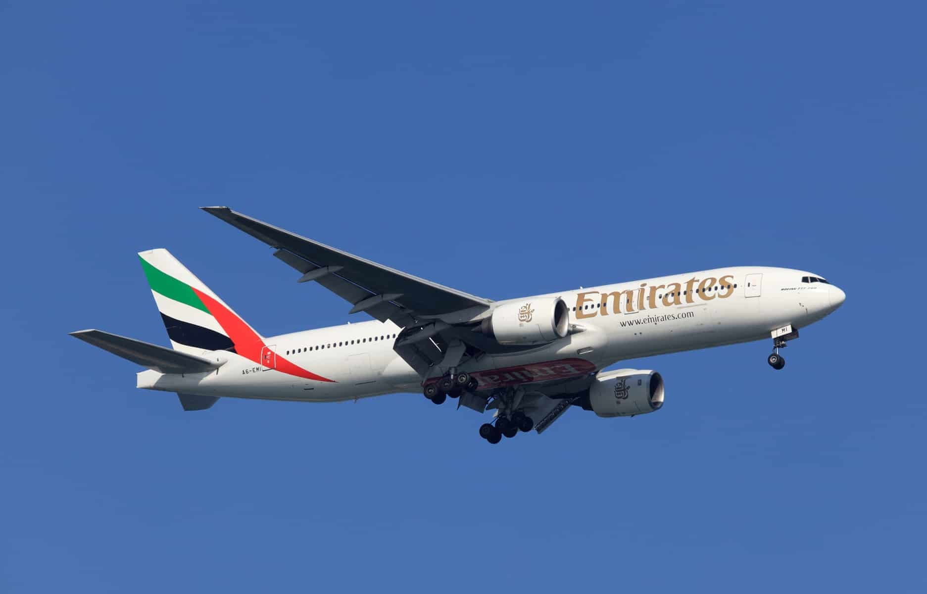 Boeing 777-200 of Emirates Airlines preparing for landing in Doha, Qatar. 